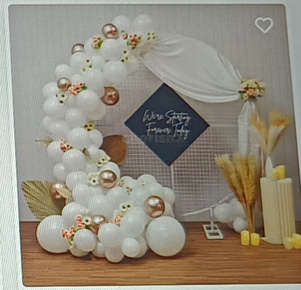 Neutral Tones Balloons and Flowers Ring decor For Roka Ceremony